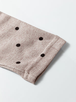Boat neck polka dot long-sleeve tee in khaki with dark brown dots.