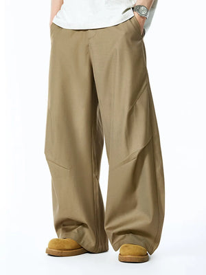 Men's deep khaki relaxed fit oversized sweatpants with panel details.