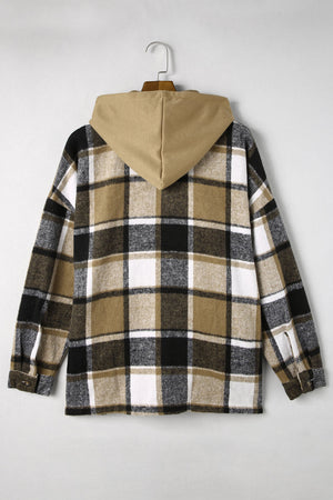 Plaid hooded shacket in tan, black, and white checkered pattern with a relaxed fit.