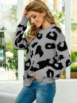 Grey leopard intarsia crewneck sweater with long sleeves and a relaxed fit.