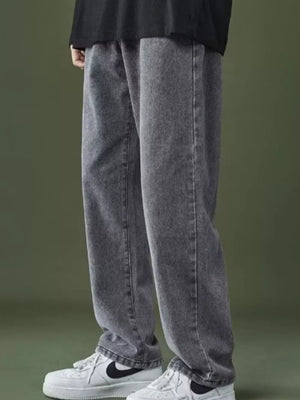Men's grey washed wide-leg jeans with a casual fit.