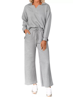 Gray V-neck textured lounge set with diagonal pattern, drawstring waist pants and long sleeve top.
