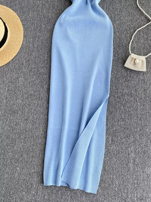 Light blue ribbed knit midi dress with a side slit and cutout detail.