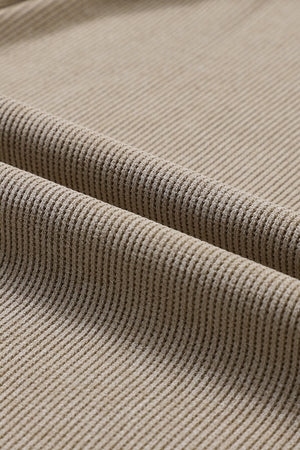 Tan ribbed sweatshirt fabric detail
