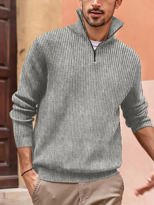 Gray ribbed quarter-zip pullover sweater with a tall collar and black zipper detail.