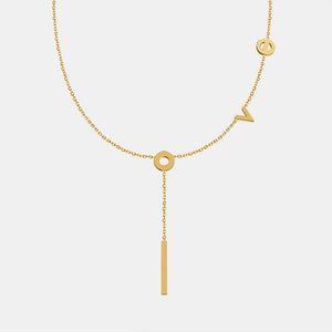Gold Love Letter Pendant Necklace with charm details