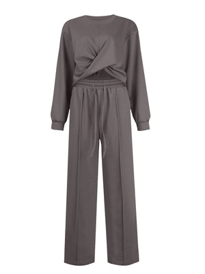 Cross-front knit lounge set in dark gray with drawstring wide-leg pants.