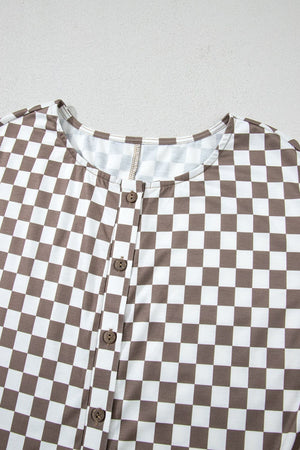 Checkered mocha palazzo jumpsuit with button front and cap sleeves.