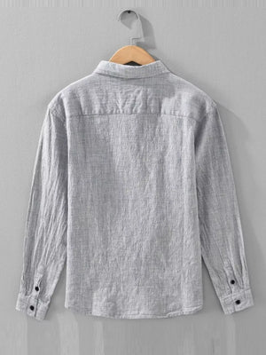 Grey linen textured long sleeve button-up shirt with button cuffs.