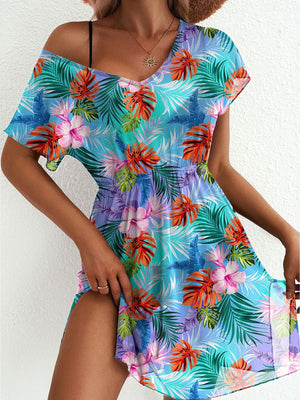 Vibrant leaf print mini dress with slit and off-shoulder neckline in sky blue.