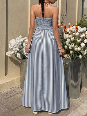Blue striped halter maxi dress with smocked bodice and a-line skirt