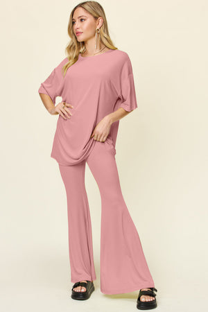 Dusty Pink oversized tee and flare leg pants set with round neckline and short sleeves.