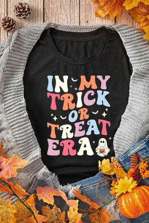 Black graphic t-shirt with colorful "In My Trick or Treat Era" text and a ghost graphic.