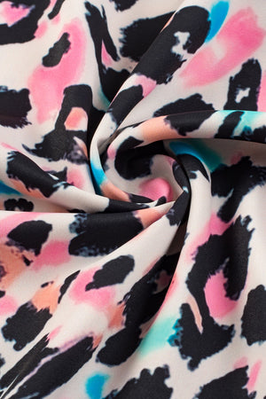 Color Pop Leopard Print Batwing Top fabric detail with black, pink, blue, and peach accents.