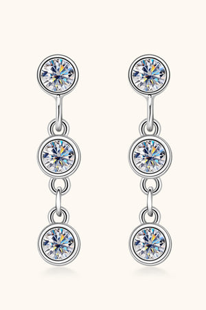 Silver triple stone cascade drop earrings with clear cubic zirconia.
