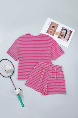 Fuchsia pink striped two-piece short set with drawstring shorts and short-sleeve top.