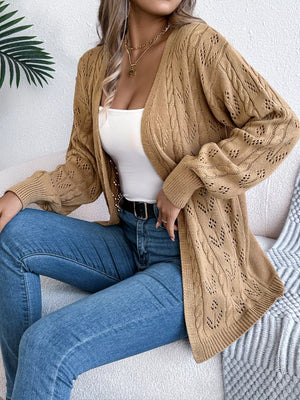 Khaki openwork cable knit long sleeve cardigan with intricate detailing.