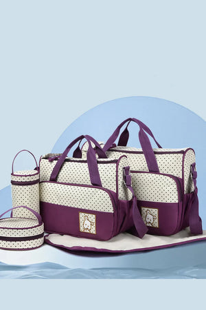 Polka dot diaper bag set in plum purple with embroidered bunny detail.