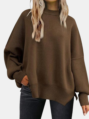 Brown ribbed knit sweater with slouchy sleeves and mock neck.