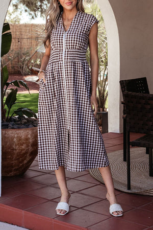 Gingham zip-front midi dress in taupe with smocked waist and cap sleeves.