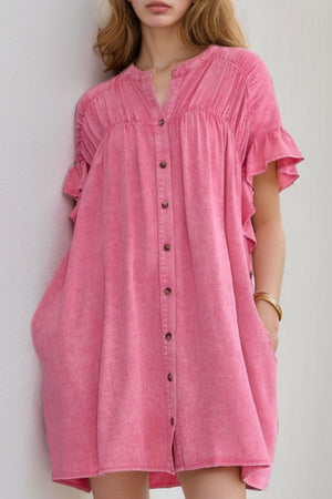 Acid wash pink ruffle shirt dress with button front and short sleeves.