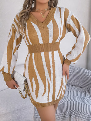 Zebra stripe knit fit-and-flare dress in tan with V-neck and long sleeves.