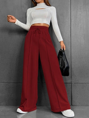 Wine red wide-leg sweatpants with drawstring waist and front seam detail