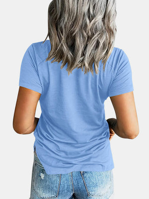 Light blue raglan pocket t-shirt with short sleeves and a casual fit.
