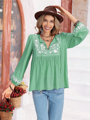 Gum Leaf embroidered yoke blouse with gathered bodice and tie neck.