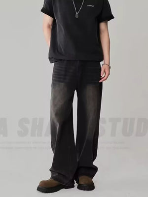 Oversized dark wash men's jeans in black gray with a relaxed fit.