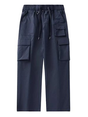 Dark blue utility sweatpants with multiple cargo pockets and drawstring waist.