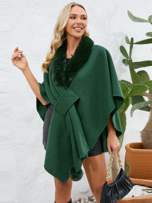 Dark green faux fur collar wrap poncho with tie detail and pom-pom trim.
