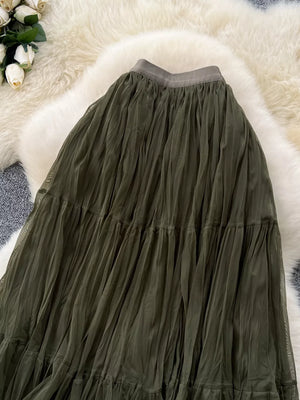 Elegant tiered tulle skirt in army green with a ruffled hem and elastic waistband.