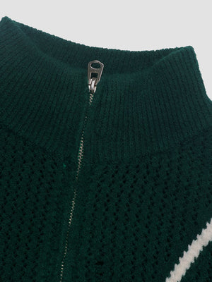 Dark green textured knit sweater with zip neck and chevron trim detail.