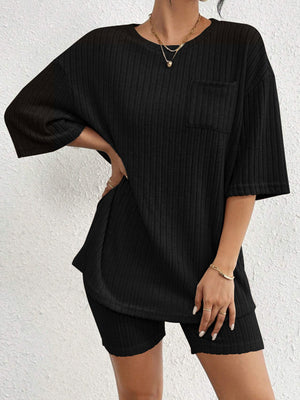 Black ribbed loungewear set with a pocket tee and biker shorts.