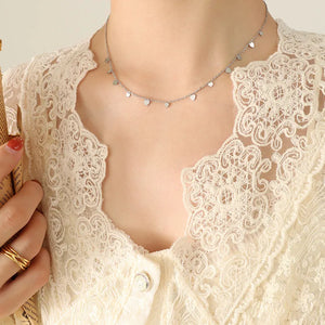 Silver heart charm chain necklace with delicate dangling hearts