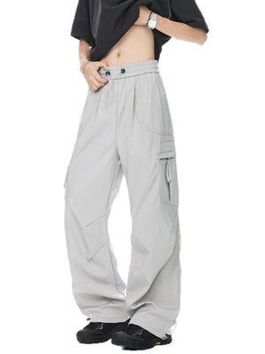 Men's light gray relaxed fit cargo sweatpants with adjustable drawstring waist and multiple pockets.