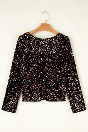 Black sequin backless blouse with long sleeves and a round neckline.