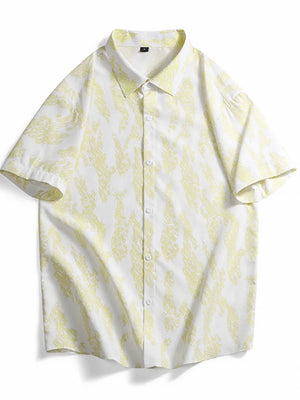 Short sleeve button-up shirt in white with abstract neon yellow pattern, cotton fabric.
