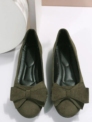 Moss suede pointed-toe flats with bow embellishment