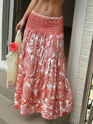 Bohemian paisley maxi skirt in burnt coral with smocked waist and tiered hem