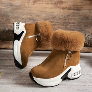 Brown plush ankle boots with side zipper and air cushion sole.