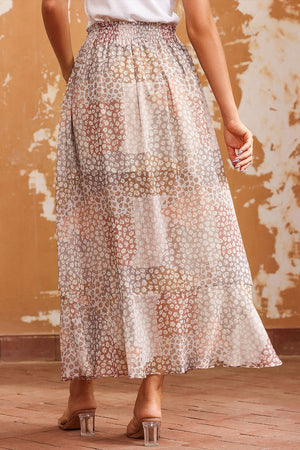 Patchwork floral maxi skirt with smocked waist and tiered hem