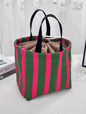 Striped Drawstring Medium Handbag, model styling view