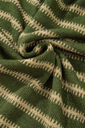 Moss green knit sweater with textured zigzag stripes in a relaxed fit.