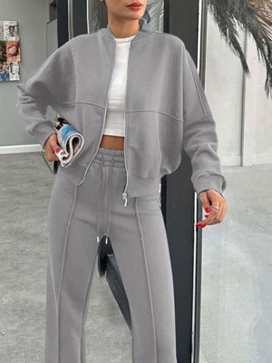 Gray bomber jacket and wide-leg tracksuit with contrast stitching