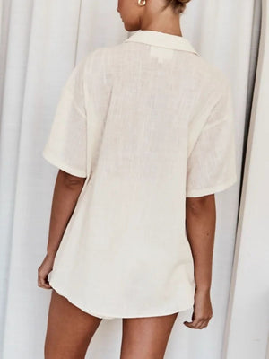 Cream linen co-ord set with short sleeves and collar, shown from the back.