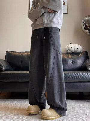 Charcoal vintage wash relaxed fit men's sweatpants with drawstring and pockets.
