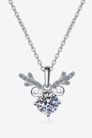 Silver reindeer pendant necklace with moissanite and 925 sterling silver chain.