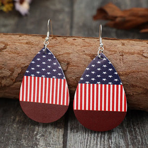 Patriotic faux leather teardrop earrings with American flag design in deep red.